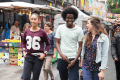 Group of young people walking and chating