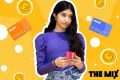 A young person is holding a credit card and the illustration shows lots of other credit cards surrounding her